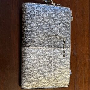 Michael Kors Metallic Silver Wallet/wristlet perfect condition!!